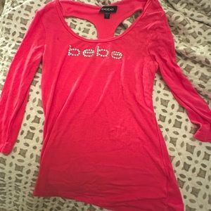 Pink BEBE shirt with rhinestones, size small, barley worn